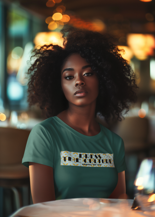 Green t-shirt with Dress the culture logo. African inspired fashion